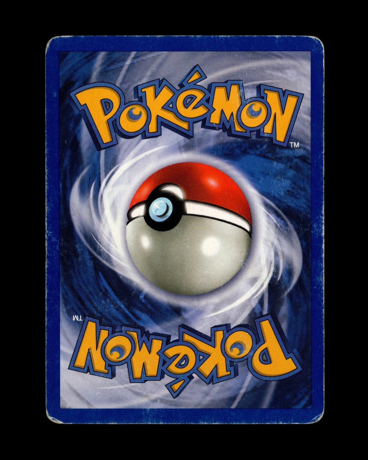 Achterkant van een originele CardVault Belgium Pokémon Dark Dragonite kaart uit 2000 met zichtbare hoekslijtage.